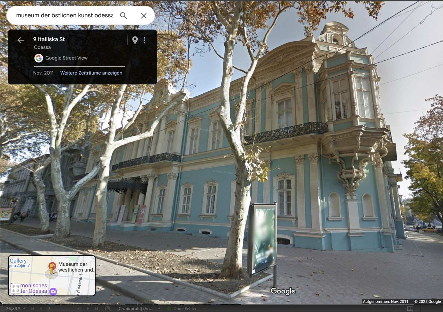 a blue historical building with elegant architectural details seen from the street trees are visible in front and a street sign indicates the location as a museum in odessa digital production A blue historical building with elegant architectural details seen from the street. Trees are visible in front, and a street sign indicates the location as a museum in Odessa.