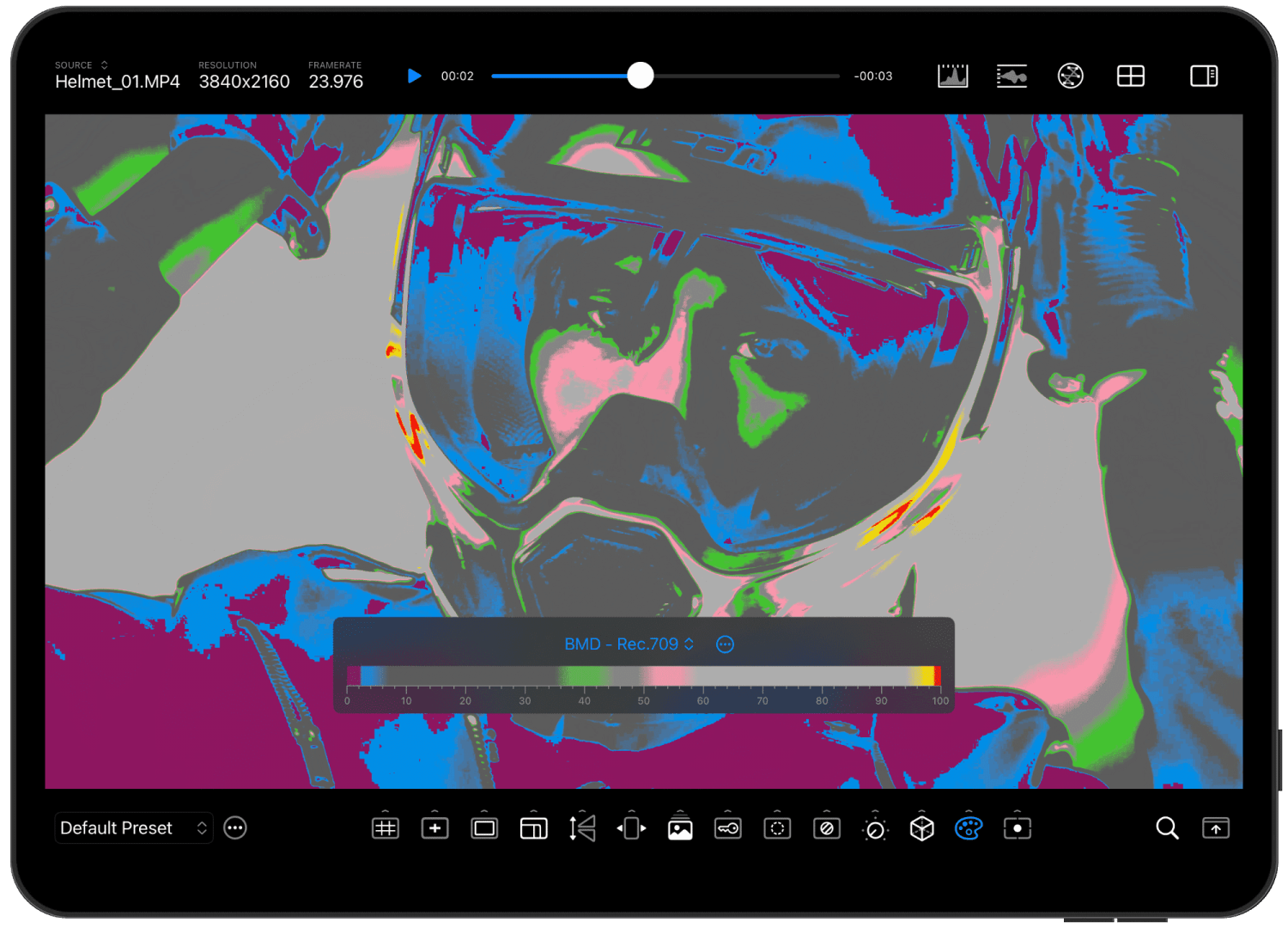 a closeup of a person wearing a colorful helmet and goggles seen on a display screen the image has been digitally altered with vibrant colors a playback control bar is shown at the bottom of the screen digital production A close-up of a person wearing a colorful helmet and goggles, seen on a display screen. The image has been digitally altered with vibrant colors. A playback control bar is shown at the bottom of the screen.
