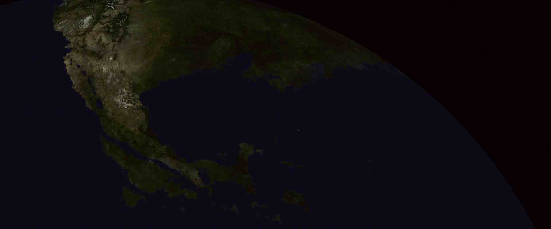 a view of the earth from space showing north america and parts of central america illuminated by sunlight the surrounding area is dark indicating the night side of the planet digital production A view of the Earth from space, showing North America and parts of Central America, illuminated by sunlight. The surrounding area is dark, indicating the night side of the planet.