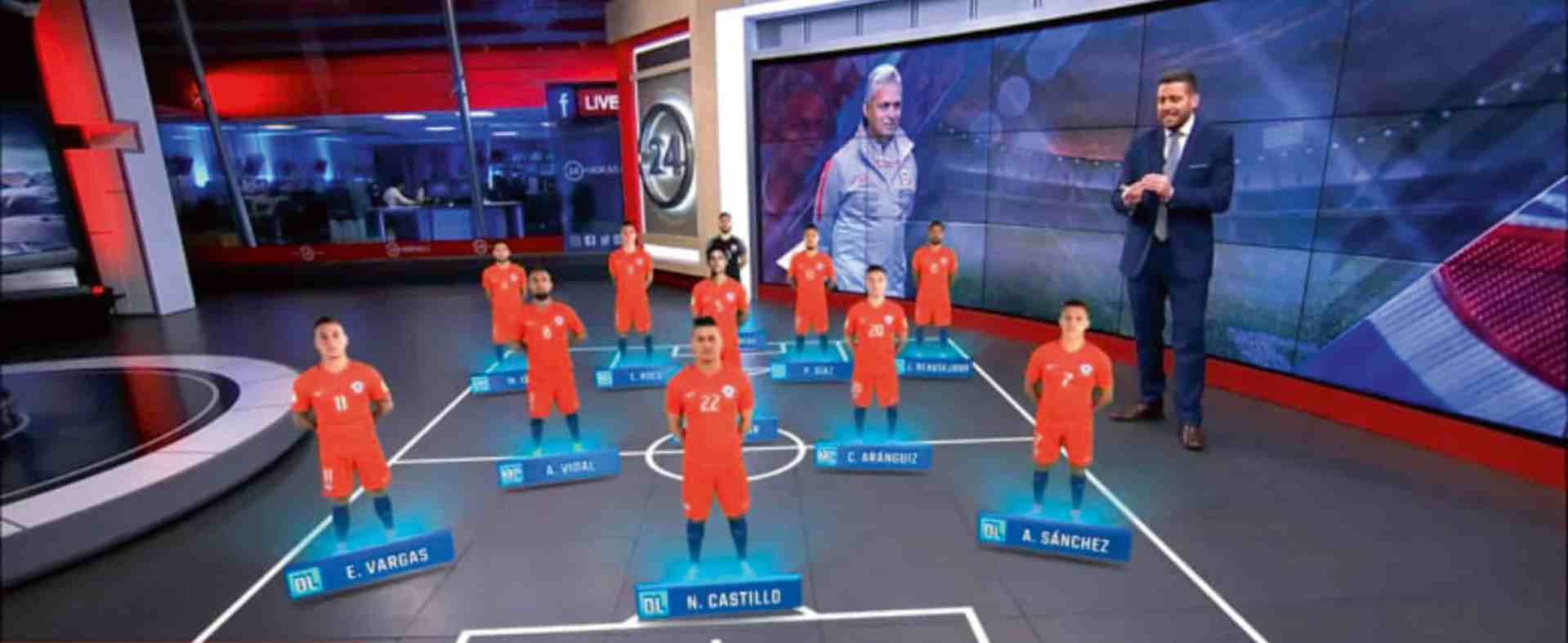 soccer players in orange uniforms arranged on a virtual field with a presenter in a suit digital production Soccer players in orange uniforms arranged on a virtual field with a presenter in a suit.