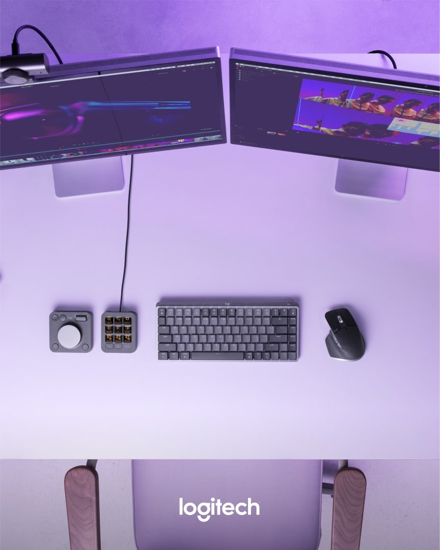 top view of a workspace with two monitors a keyboard and a mouse on a white desk digital production Top view of a workspace with two monitors, a keyboard, and a mouse on a white desk.