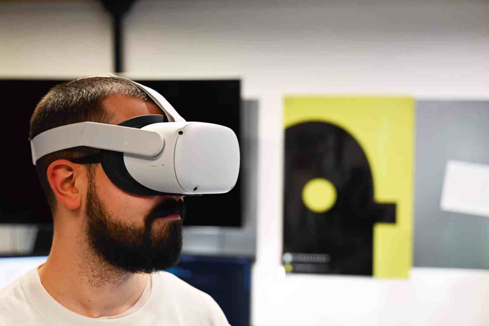 a man wearing a vr headset in an indoor setting digital production A man wearing a VR headset in an indoor setting