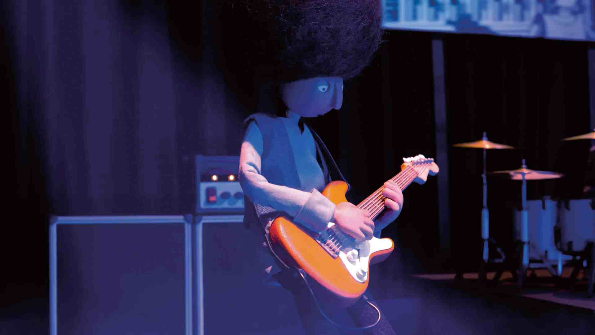 a stylized animated character with an oversized afro hairstyle playing an orange electric guitar on stage with musical equipment in the background digital production A stylized animated character with an oversized afro hairstyle playing an orange electric guitar on stage, with musical equipment in the background.
