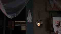 a cartoonlike polar bear illustration on a wall with a small round mirror hanging beside it the scene appears to be indoors with soft lighting and plastic draping in the background digital production A cartoon-like polar bear illustration on a wall, with a small round mirror hanging beside it. The scene appears to be indoors, with soft lighting and plastic draping in the background.