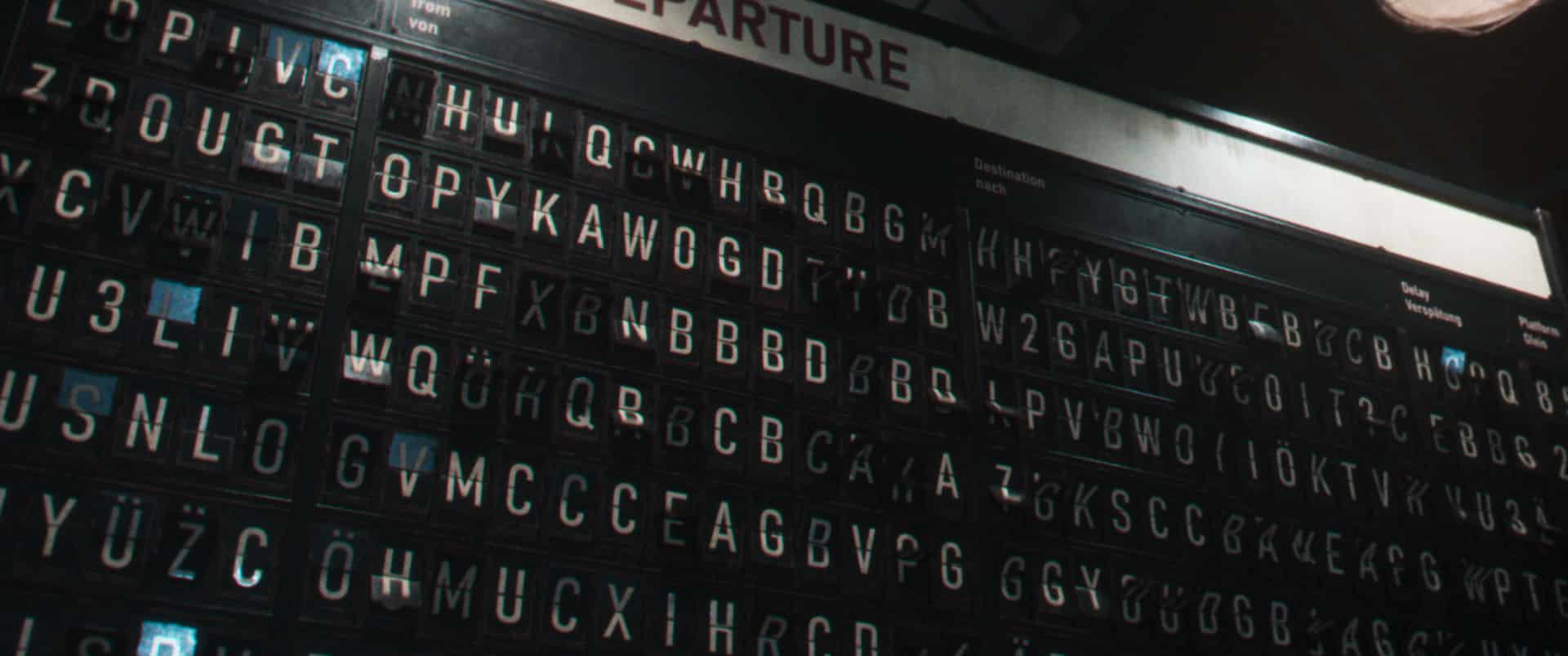 an electronic departure board displaying various flight codes and destinations in a dimly lit airport setting digital production An electronic departure board displaying various flight codes and destinations in a dimly lit airport setting.