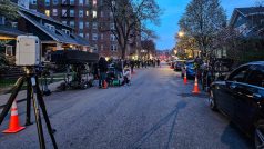 film crew set up on a city street at dusk digital production Film crew set up on a city street at dusk