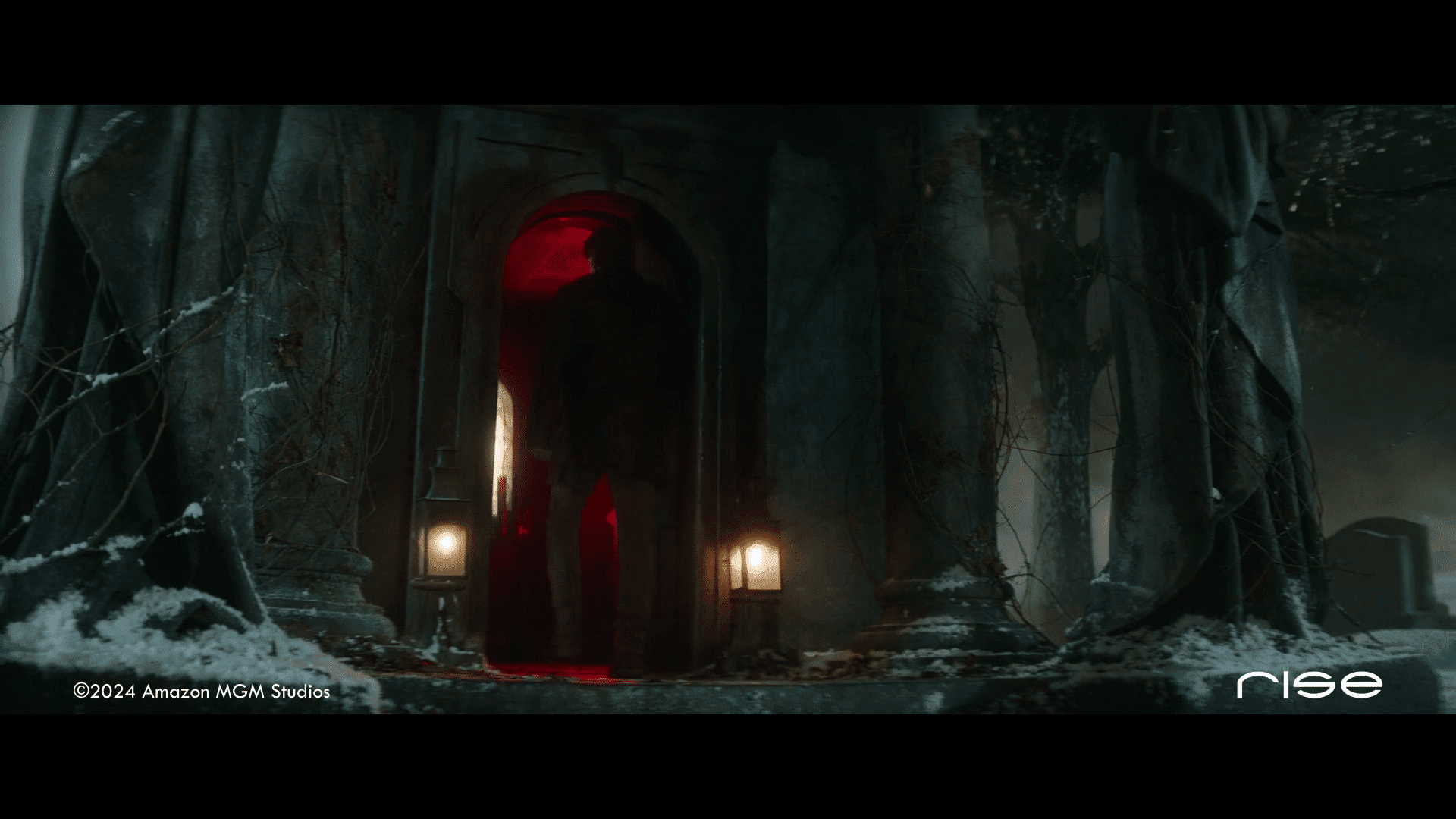 dark entrance to a crypt illuminated by red light digital production Dark entrance to a crypt illuminated by red light