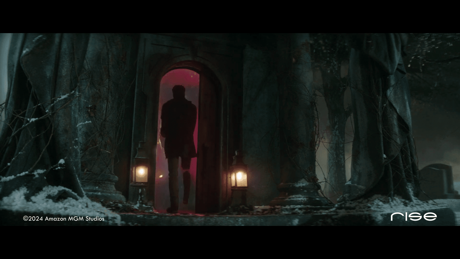 silhouette of a person entering a door with purple light digital production Silhouette of a person entering a door with purple light