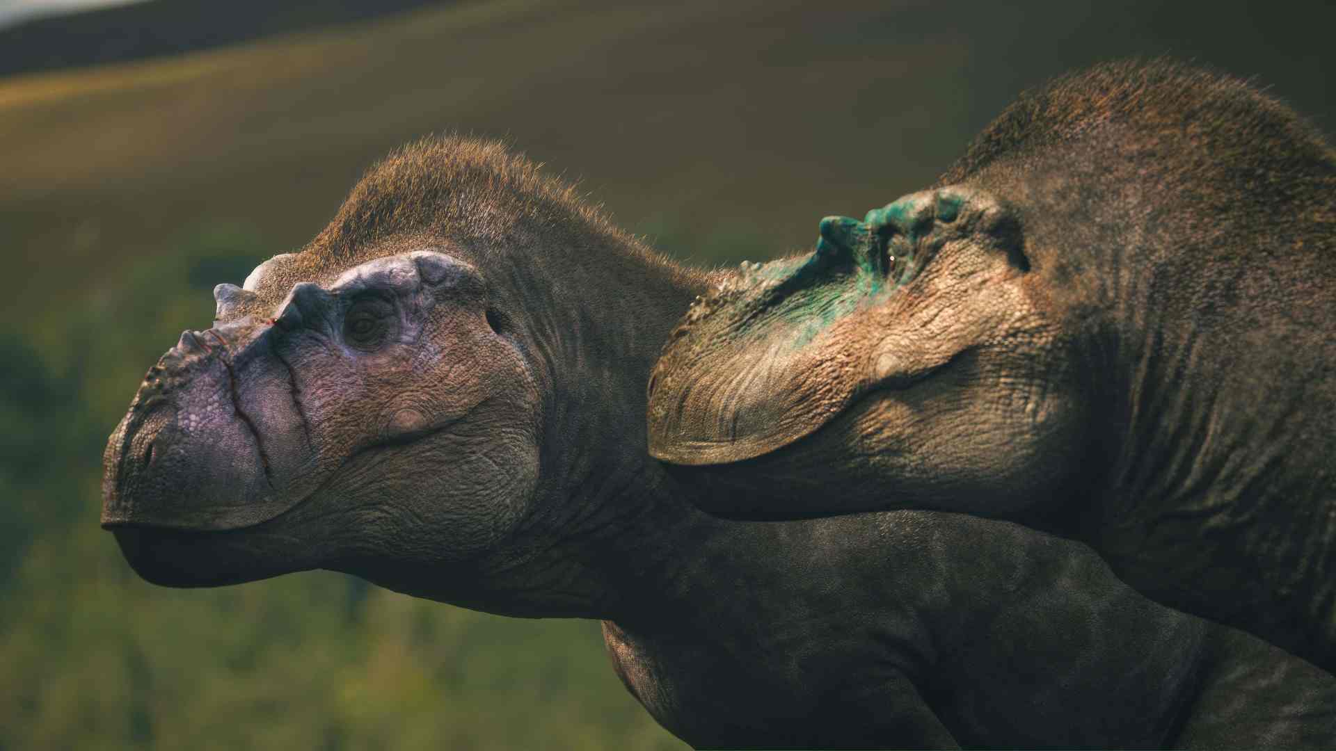 two large dinosaur heads positioned closely together showcasing textured skin and distinct features against a blurred green landscape in the background digital production Two large dinosaur heads positioned closely together, showcasing textured skin and distinct features against a blurred green landscape in the background.
