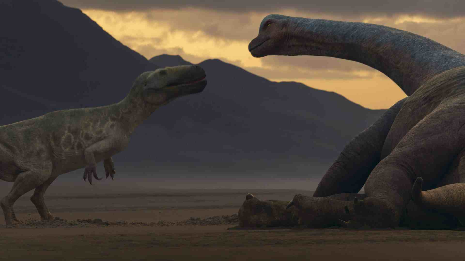 a scene depicting two dinosaurs in a prehistoric setting a large sauropod resting on the ground is approached by a smaller theropod with mountains and a dramatic sky in the background hinting at a bygone era digital production A scene depicting two dinosaurs in a prehistoric setting. A large sauropod, resting on the ground, is approached by a smaller theropod, with mountains and a dramatic sky in the background, hinting at a bygone era.