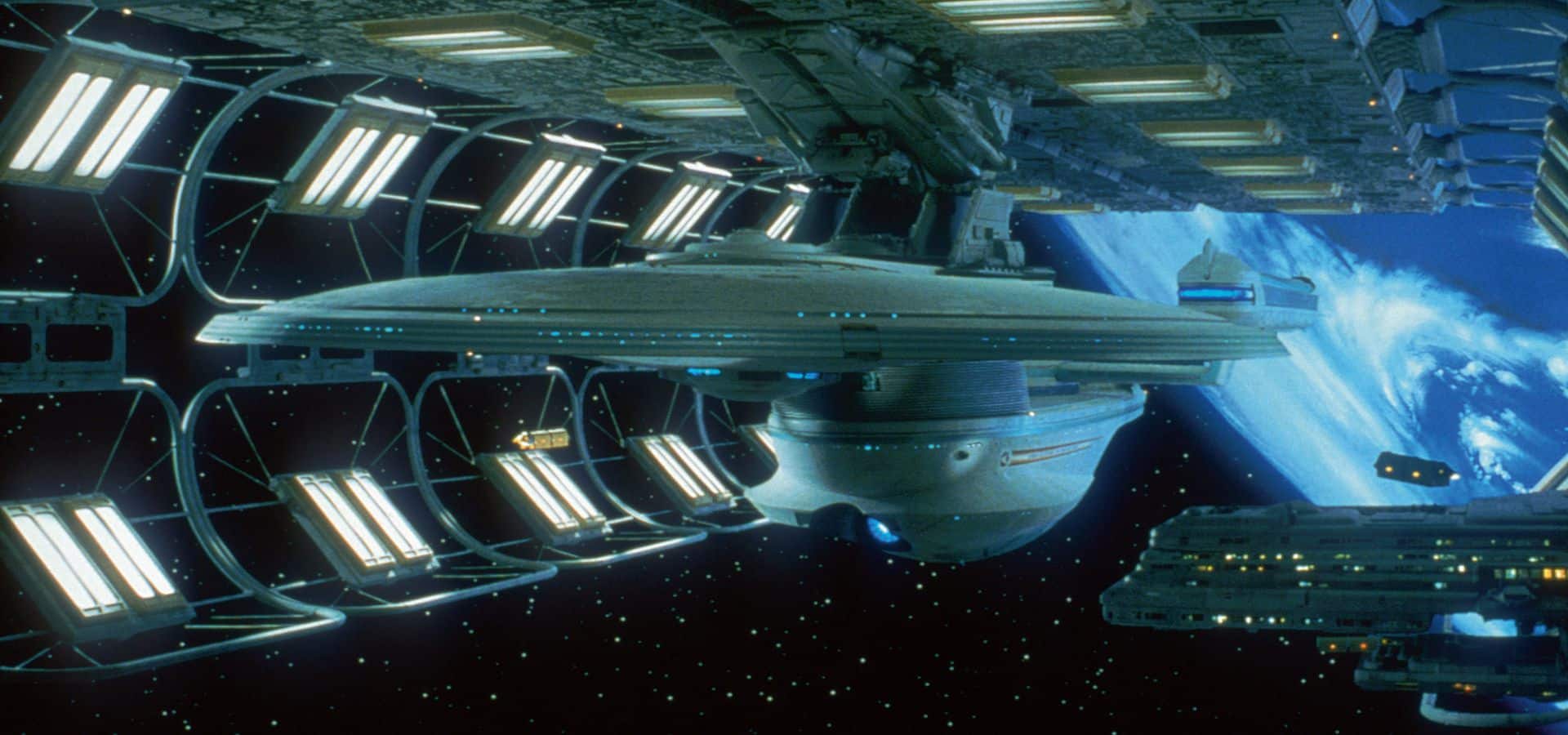 a large spaceship with a sleek design docked at a futuristic space station surrounded by a starry backdrop and glimpses of earth visible in the distance digital production A large spaceship with a sleek design docked at a futuristic space station, surrounded by a starry backdrop and glimpses of Earth visible in the distance.