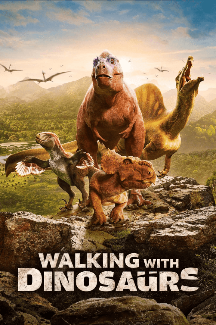 four animated dinosaurs standing on a rocky surface in a prehistoric landscape in the background lush green hills and flying pterosaurs are visible under a bright sky the title walking with dinosaurs is prominently displayed at the bottom digital production Four animated dinosaurs standing on a rocky surface in a prehistoric landscape. In the background, lush green hills and flying pterosaurs are visible under a bright sky. The title 'Walking with Dinosaurs' is prominently displayed at the bottom.