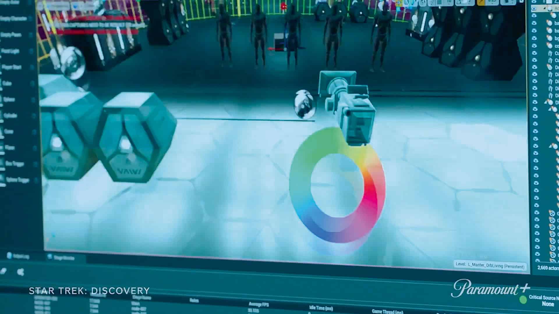 a computer interface displaying a 3d modeling software for a scifi environment featuring a color wheel virtual objects and a grid floor the design elements include weapons and character models in the background digital production A computer interface displaying a 3D modeling software for a sci-fi environment, featuring a color wheel, virtual objects, and a grid floor. The design elements include weapons and character models in the background.