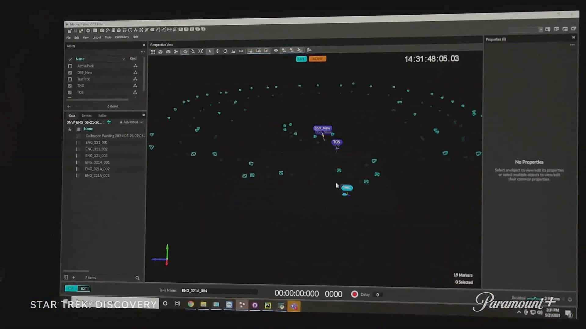 a computer screen displaying a digital software interface used for visual effects in film production featuring various icons and a timeline with a dark background illuminated by colorful elements digital production A computer screen displaying a digital software interface used for visual effects in film production, featuring various icons and a timeline, with a dark background illuminated by colorful elements.