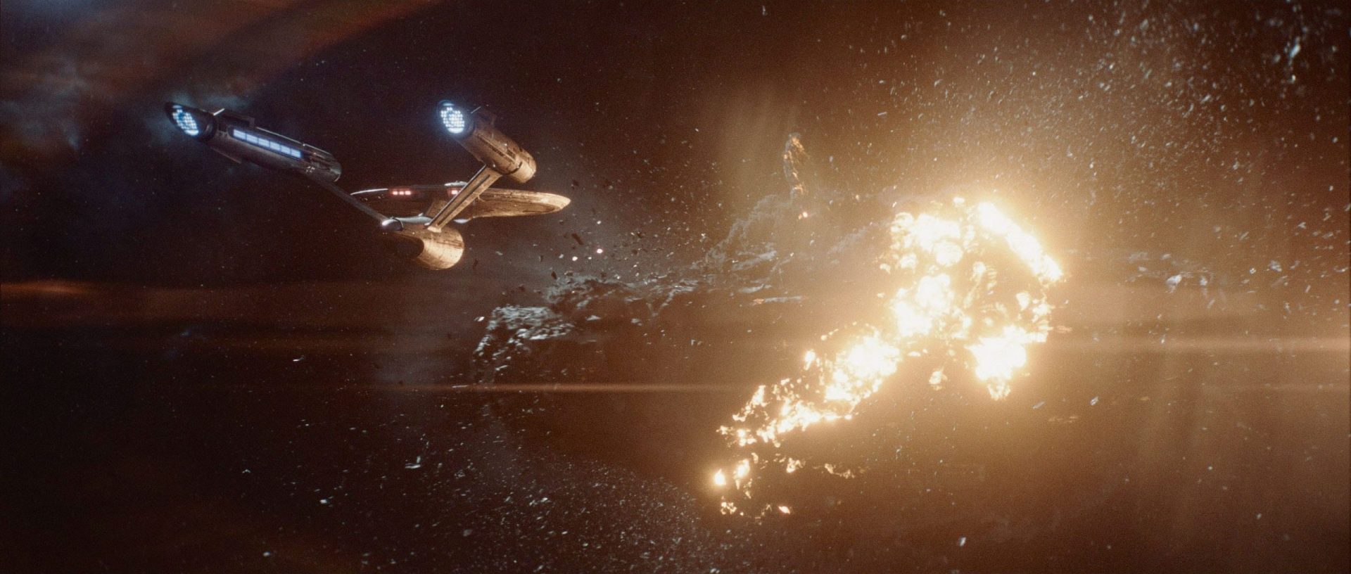 a futuristic spacecraft navigating through space approaching a large illuminated debris field that is partially engulfed in flames stars twinkle in the dark cosmic background creating a sense of depth and mystery digital production A futuristic spacecraft navigating through space, approaching a large, illuminated debris field that is partially engulfed in flames. Stars twinkle in the dark cosmic background, creating a sense of depth and mystery.