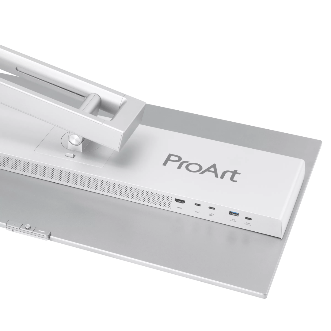 a closeup view of a proart monitor featuring a sleek white design with ports including usbc and hdmi the monitor is shown with a silver base and an adjustable arm emphasizing its modern aesthetic suited for creative professionals digital production A close-up view of a ProArt monitor, featuring a sleek white design with ports including USB-C and HDMI. The monitor is shown with a silver base and an adjustable arm, emphasizing its modern aesthetic suited for creative professionals.