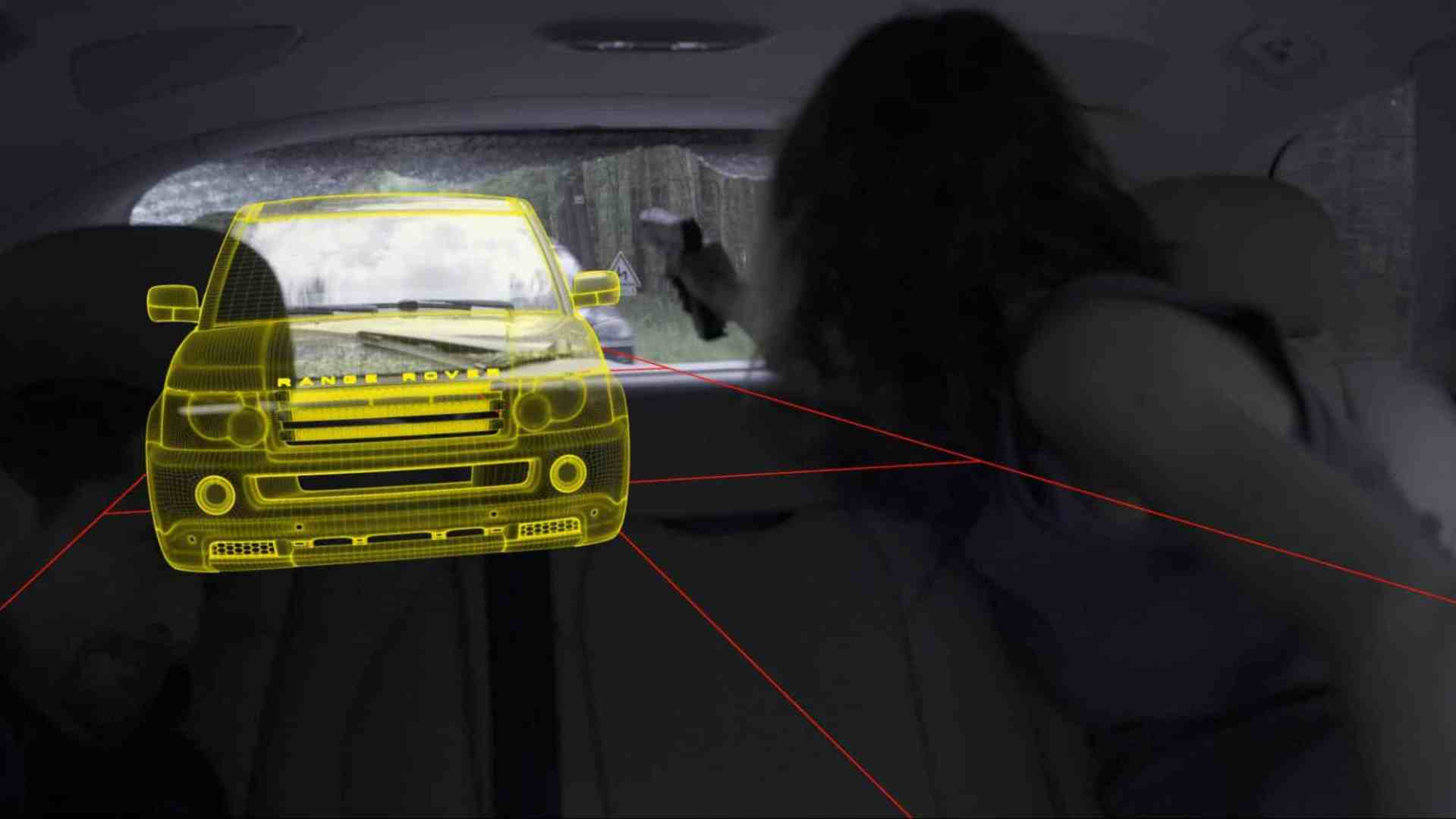 an interior view of a cars backseat showing a woman reaching out an overlay graphics of a yellow outlined suv is projected in front of her with red lines indicating distance or proximity digital production An interior view of a car's backseat showing a woman reaching out. An overlay graphics of a yellow outlined SUV is projected in front of her, with red lines indicating distance or proximity.