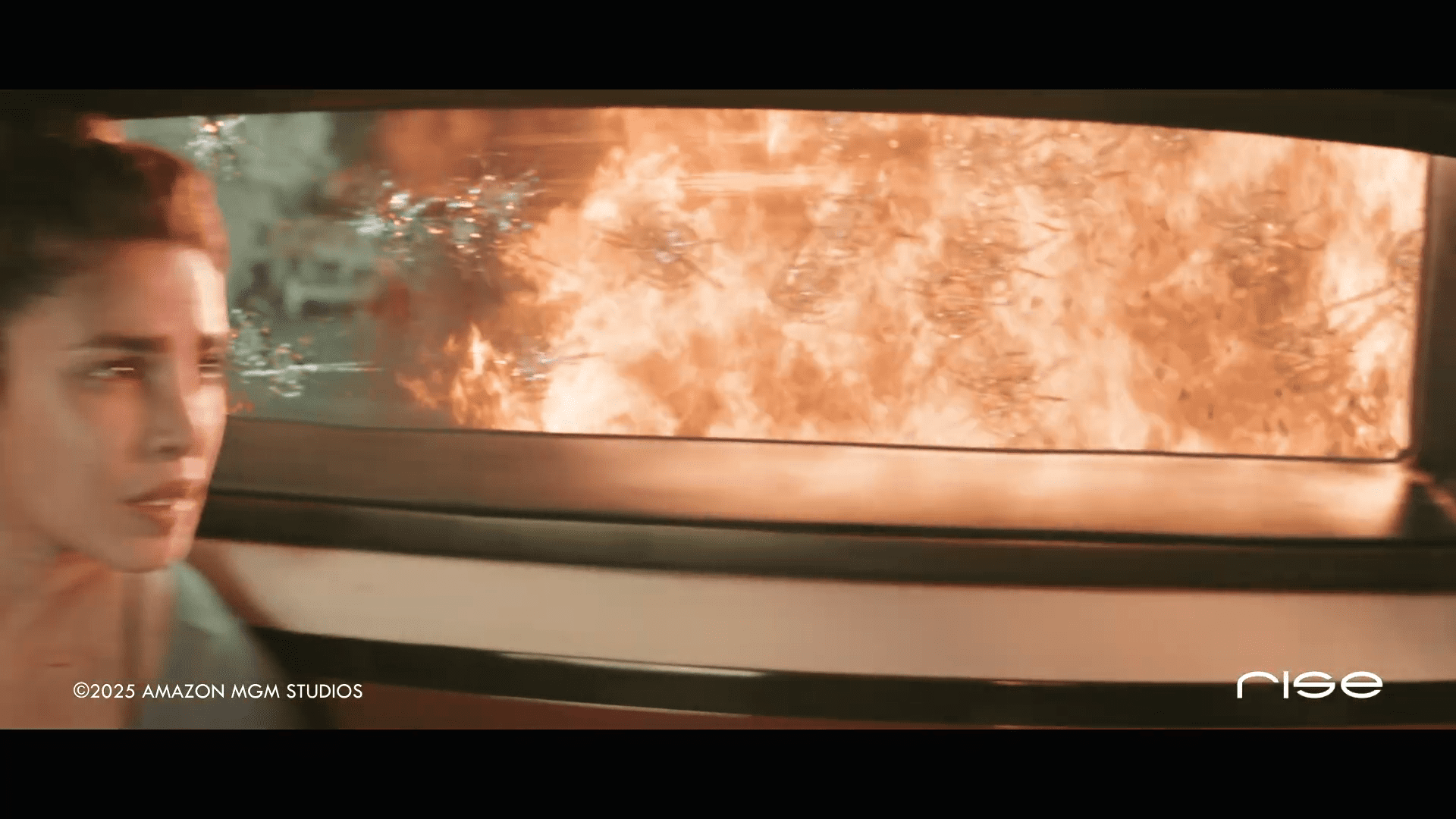 a woman looking tense in a vehicle with flames and smoke visible outside the window the scene conveys a sense of urgency and danger with intense colors reflecting the fire contrasted against the interior of the car digital production A woman looking tense in a vehicle, with flames and smoke visible outside the window. The scene conveys a sense of urgency and danger, with intense colors reflecting the fire contrasted against the interior of the car.