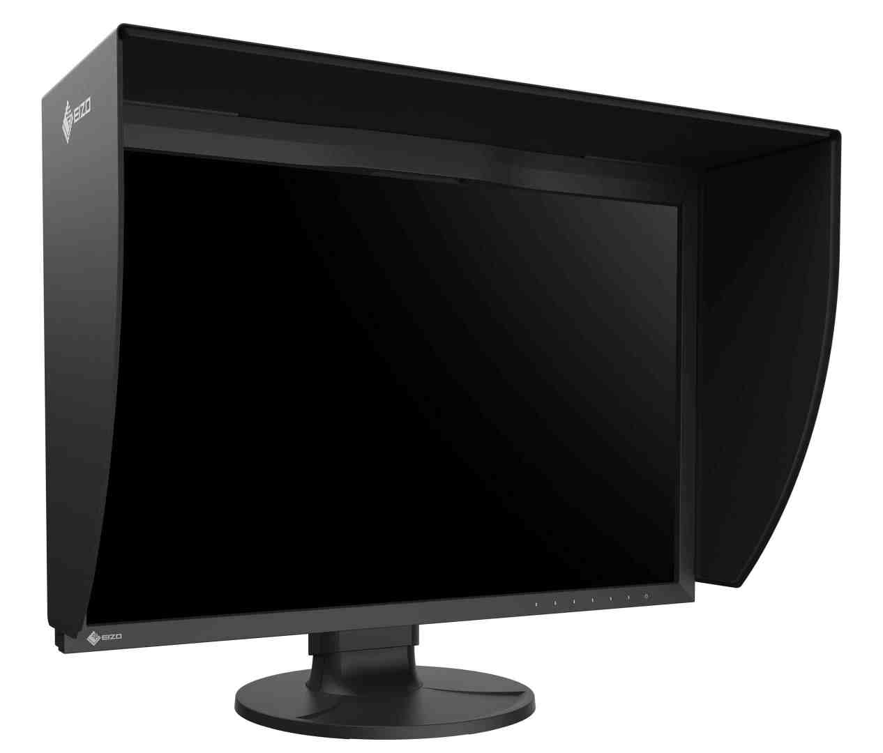 a professional monitor with a matte black exterior and a sunshade attached to the top designed to reduce glare the monitor features a round base and a minimalistic front with visible buttons along the bottom edge digital production A professional monitor with a matte black exterior and a sunshade attached to the top, designed to reduce glare. The monitor features a round base and a minimalistic front, with visible buttons along the bottom edge.