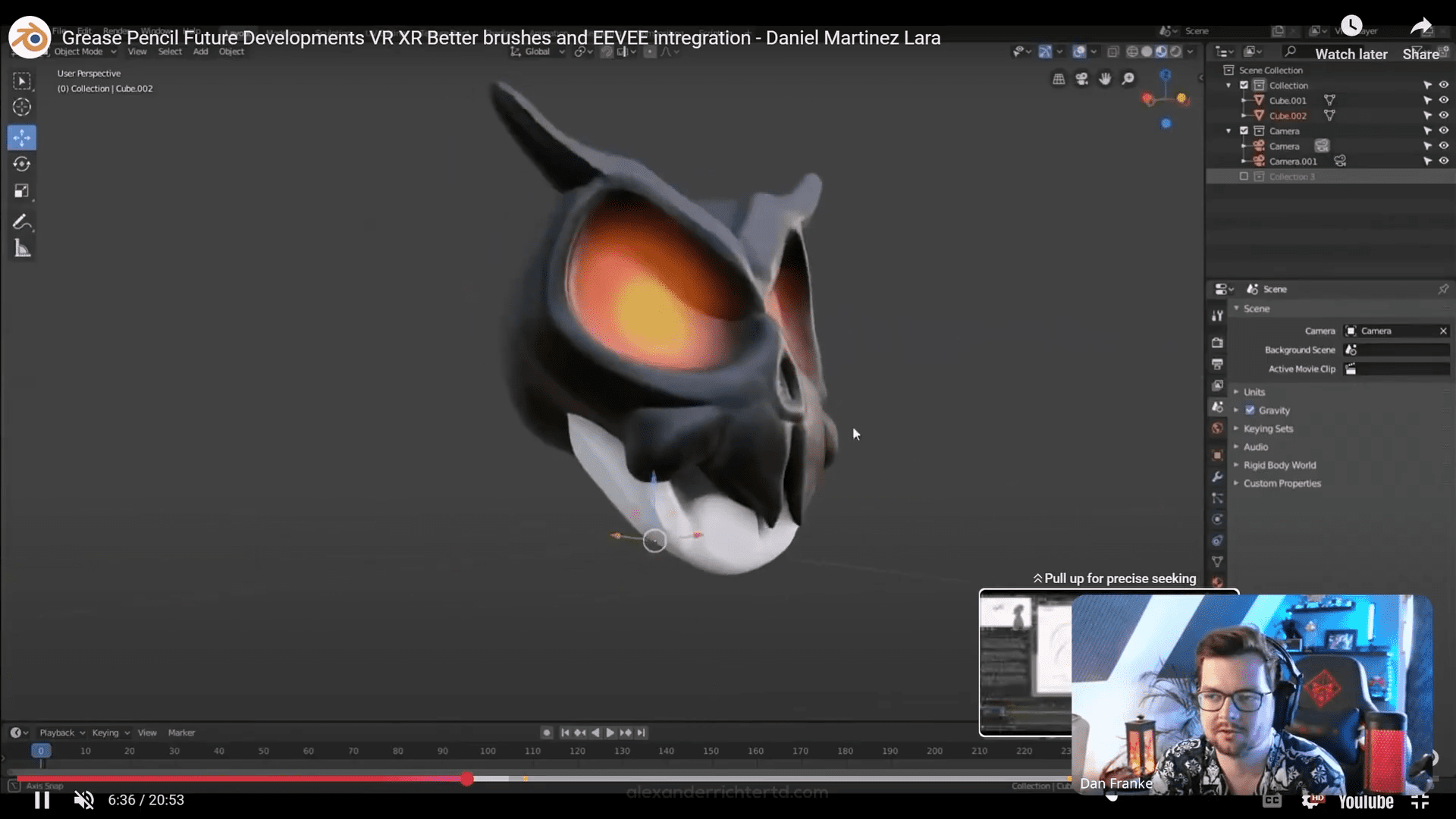 a digital artist demonstrating a 3d model of a stylized skull with glowing orange eyes in blender the artist appears engaged sitting at a computer with dual monitors and design tools visible on the desk digital production A digital artist demonstrating a 3D model of a stylized skull with glowing orange eyes in Blender. The artist appears engaged, sitting at a computer with dual monitors and design tools visible on the desk.