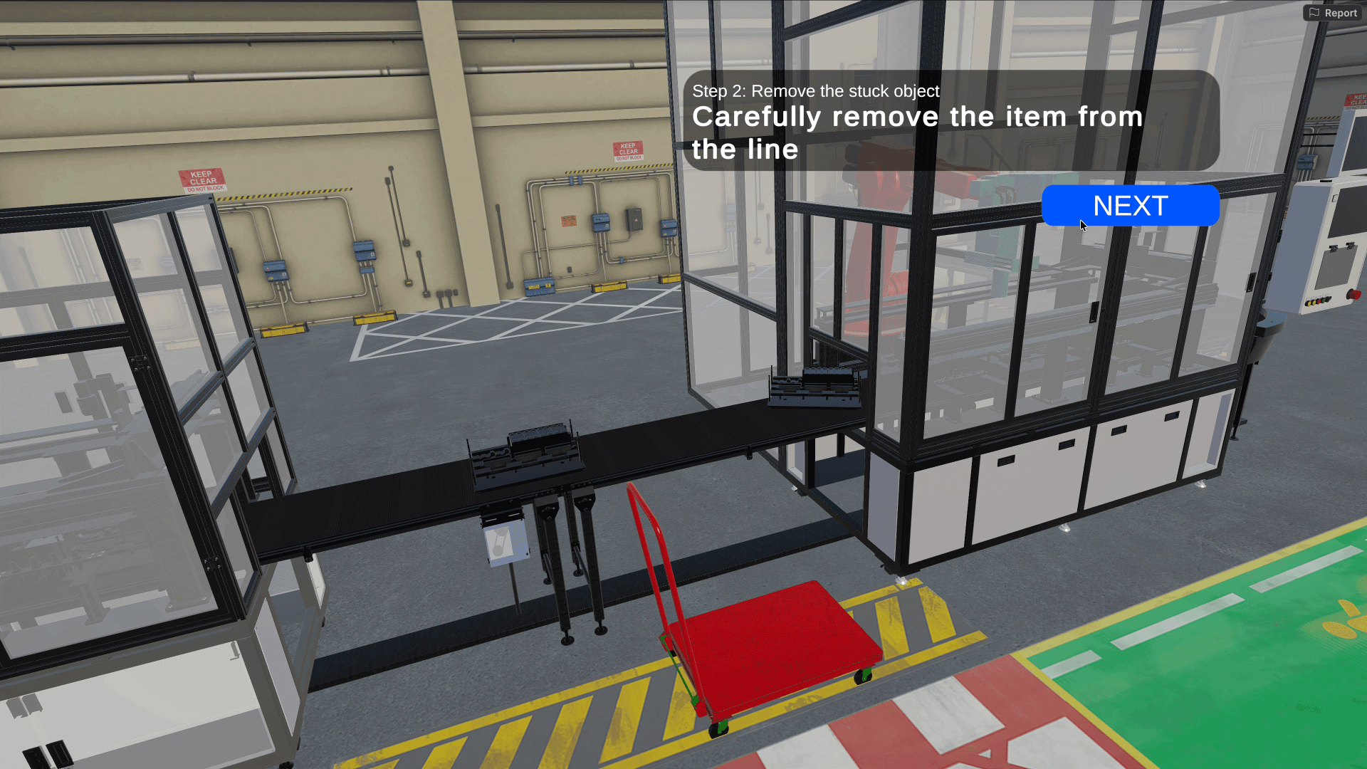 a digital display shows instructions for removing a stuck object from a conveyor line in an industrial setting a red cart is positioned near the conveyor and workstations with equipment are visible in the background digital production A digital display shows instructions for removing a stuck object from a conveyor line in an industrial setting. A red cart is positioned near the conveyor, and workstations with equipment are visible in the background.