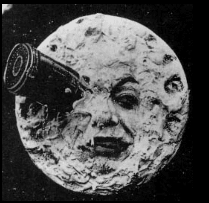 an artistic depiction of a moon with a human face featuring a camera protruding from its surface evoking early science fiction themes digital production An artistic depiction of a moon with a human face, featuring a camera protruding from its surface, evoking early science fiction themes.