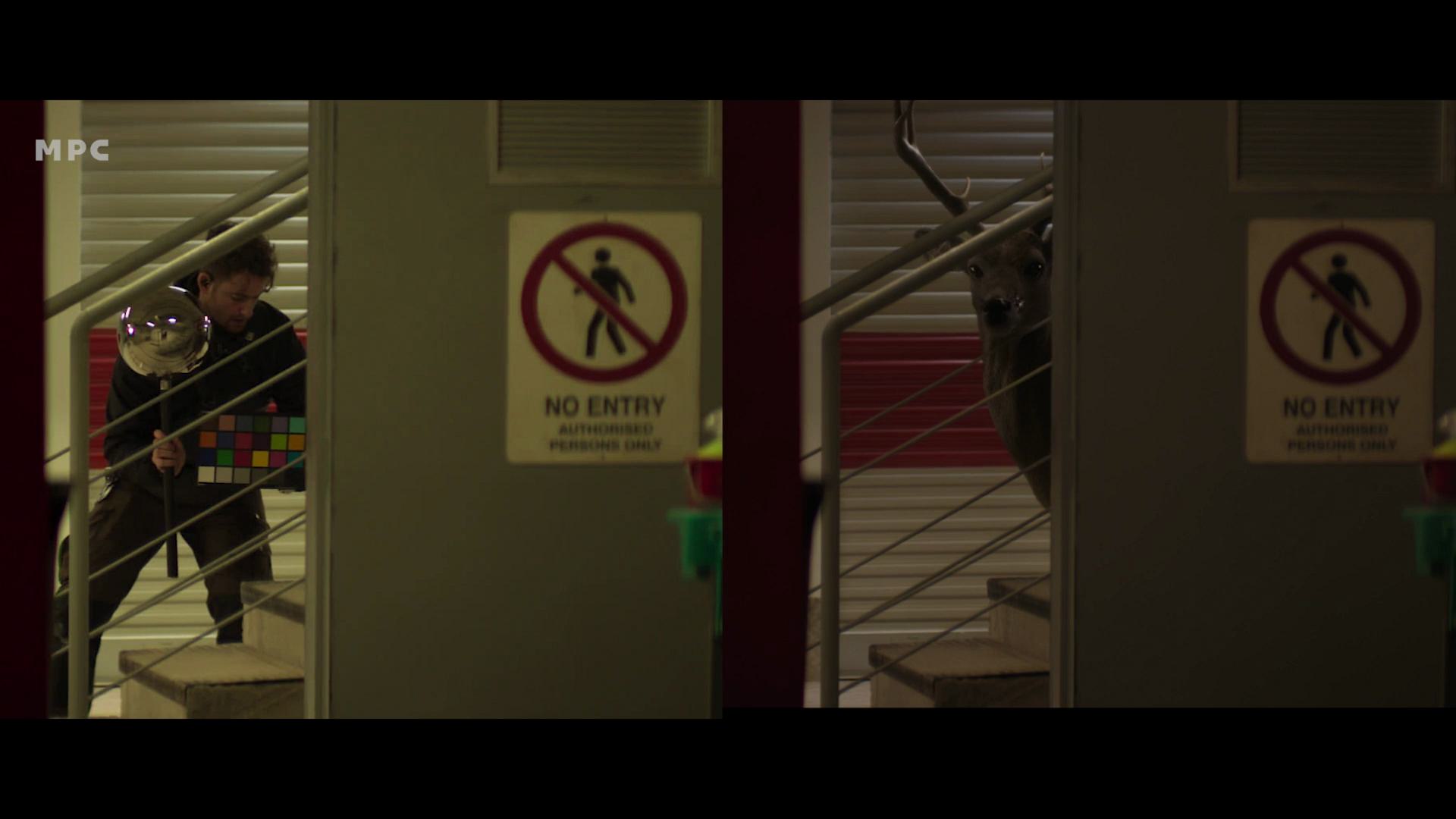 a person carrying a colorful rubiks cube and a reflective sphere walks down a staircase while a deer stands at the top of the stairs next to a no entry sign digital production A person carrying a colorful Rubik's cube and a reflective sphere walks down a staircase, while a deer stands at the top of the stairs next to a 'No Entry' sign.