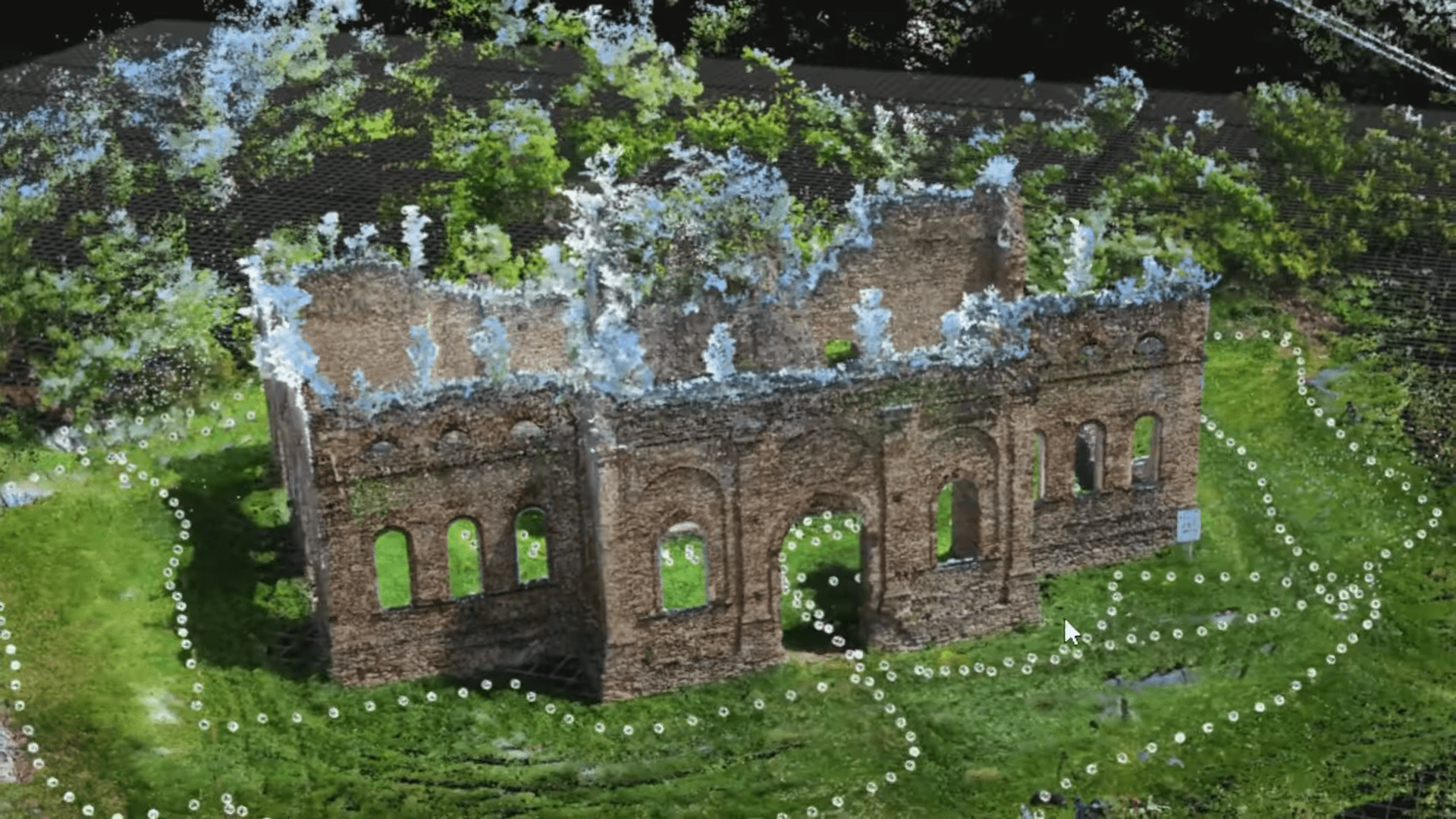 a digitally rendered 3d model of a ruined stone structure surrounded by lush greenery the walls display captivating textures with crumbling edges and multiple arched windows delicate flowers and vibrant foliage partially cover the ruins enhancing the serene atmosphere of nature reclaiming the historic site digital production A digitally rendered 3D model of a ruined stone structure surrounded by lush greenery. The walls display captivating textures, with crumbling edges and multiple arched windows. Delicate flowers and vibrant foliage partially cover the ruins, enhancing the serene atmosphere of nature reclaiming the historic site.