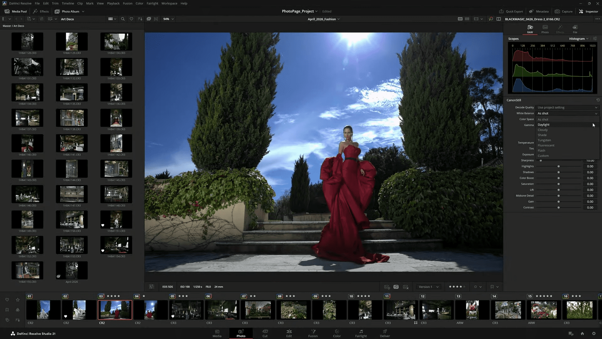 a model in a flowing vibrant red gown stands gracefully on stone steps framed by lush green foliage and tall cypress trees the bright blue sky is dotted with fluffy white clouds creating a striking backdrop the scene is captured in a photo editing software interface digital production A model in a flowing, vibrant red gown stands gracefully on stone steps, framed by lush green foliage and tall cypress trees. The bright blue sky is dotted with fluffy white clouds, creating a striking backdrop. The scene is captured in a photo editing software interface.