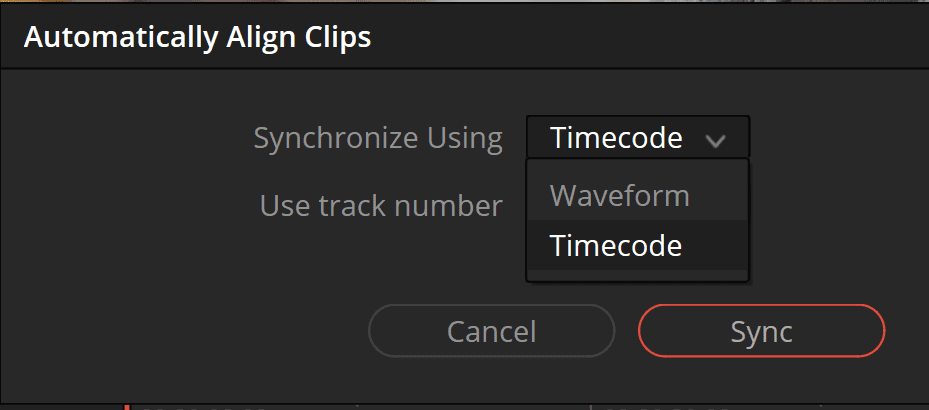 a darkthemed editing interface displays a popup window titled automatically align clips it includes options labeled synchronize using with a dropdown menu and selections for use track number two buttons at the bottom read cancel and sync with the sync button highlighted in bright red digital production A dark-themed editing interface displays a pop-up window titled 'Automatically Align Clips.' It includes options labeled 'Synchronize Using' with a dropdown menu, and selections for 'Use track number.' Two buttons at the bottom read 'Cancel' and 'Sync,' with the 'Sync' button highlighted in bright red.