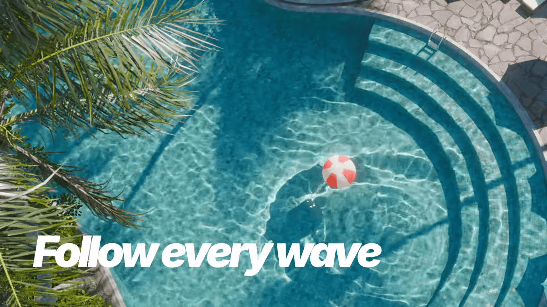 a vibrant swimming pool glimmers under the sun highlighted by sunlight dancing on the waters surface a beach ball with red and white stripes floats in the inviting blue water while lush palm leaves frame the scene conveying a relaxed atmosphere of summer fun digital production A vibrant swimming pool glimmers under the sun, highlighted by sunlight dancing on the water's surface. A beach ball with red and white stripes floats in the inviting blue water, while lush palm leaves frame the scene, conveying a relaxed atmosphere of summer fun.